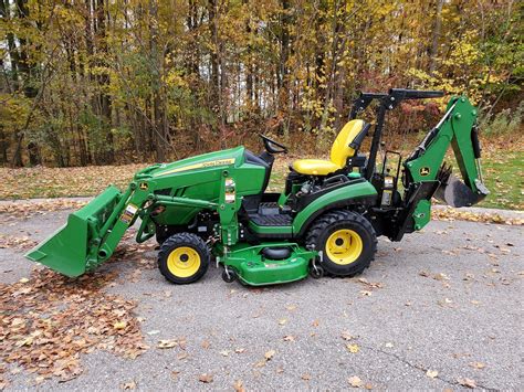 sub compact track loader|smallest tractor with front loader.